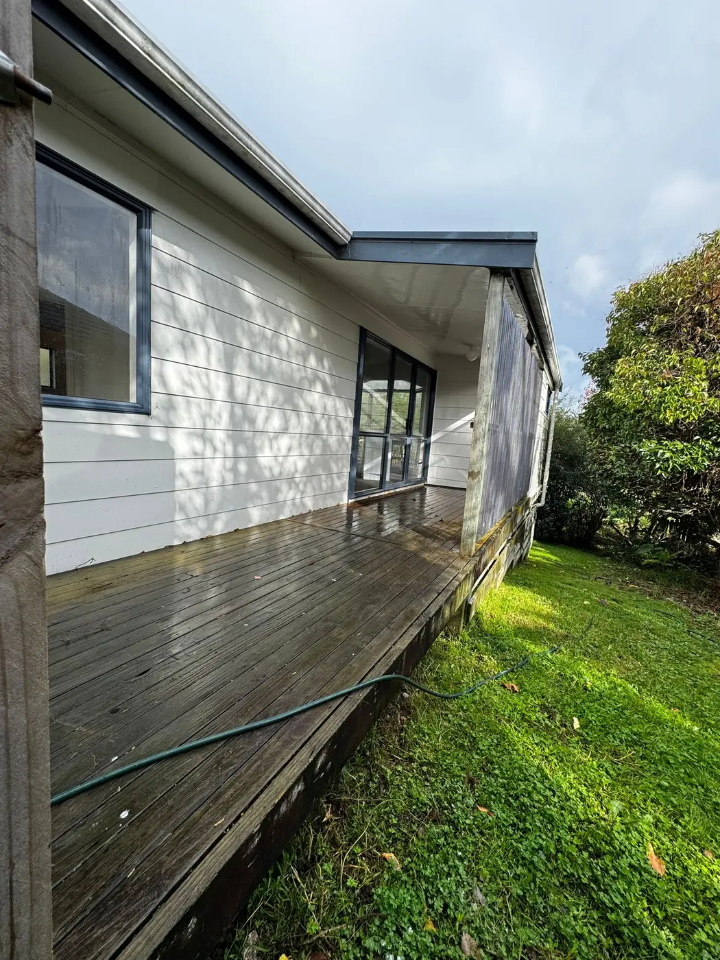 House exterior and deck after cleaning