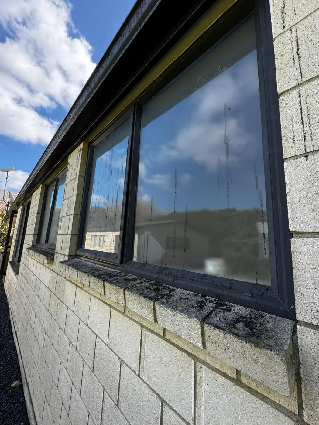 Exterior window before detailed cleaning