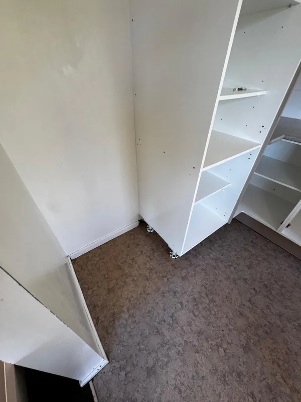 Professional move out cleaning Auckland — floor behind appliances cleaned to standard